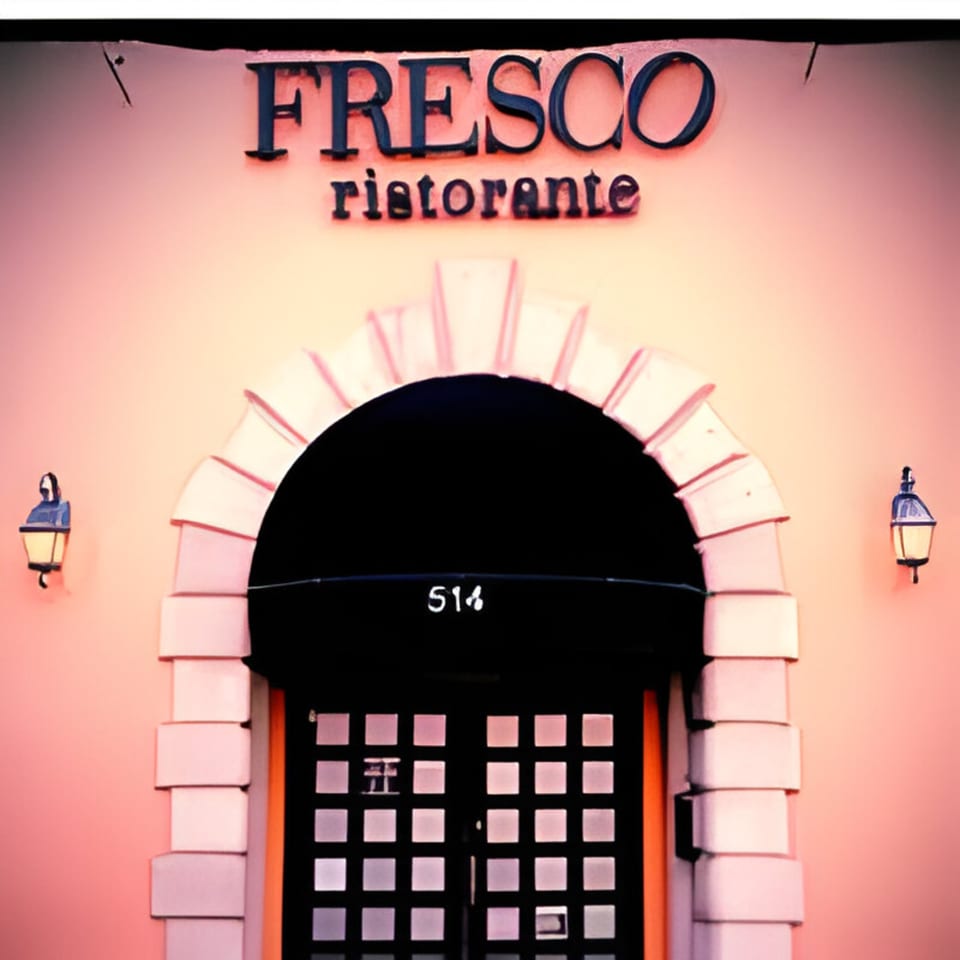 Fresco Ristorante's entrance with a black awning, arched stone, and two lanterns on a peach wall.
